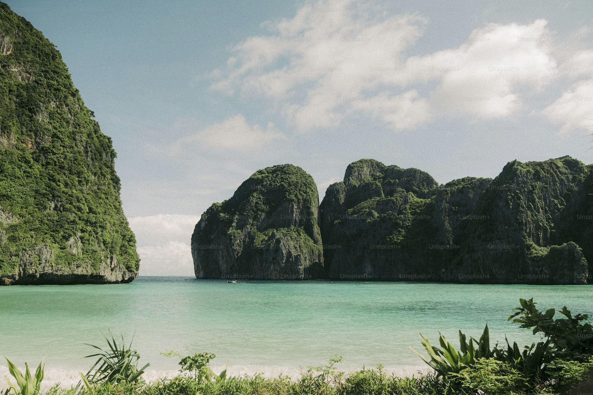 Krabi longtail boats and limestone cliffs