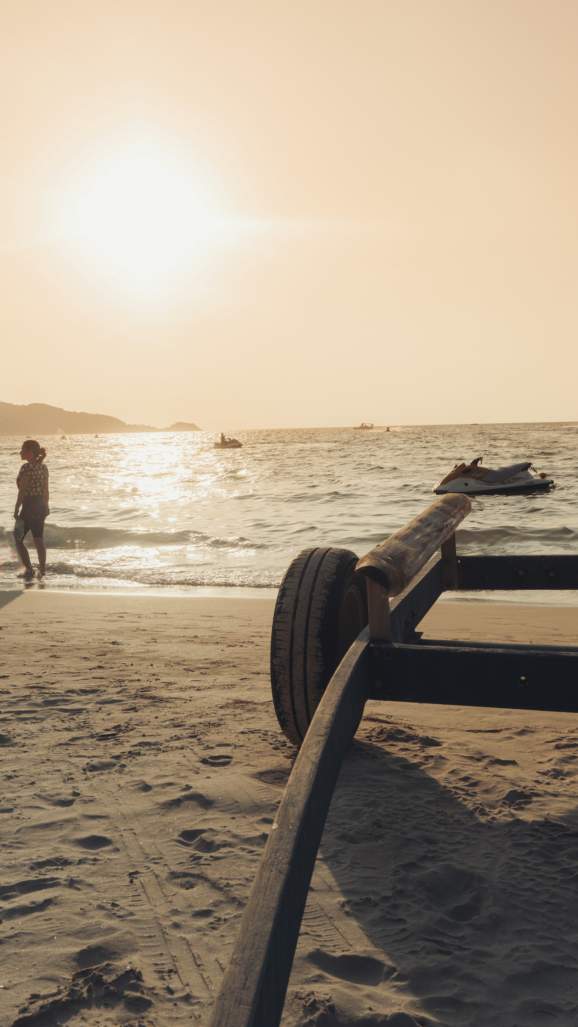 Phuket beach sunset with longtail boat